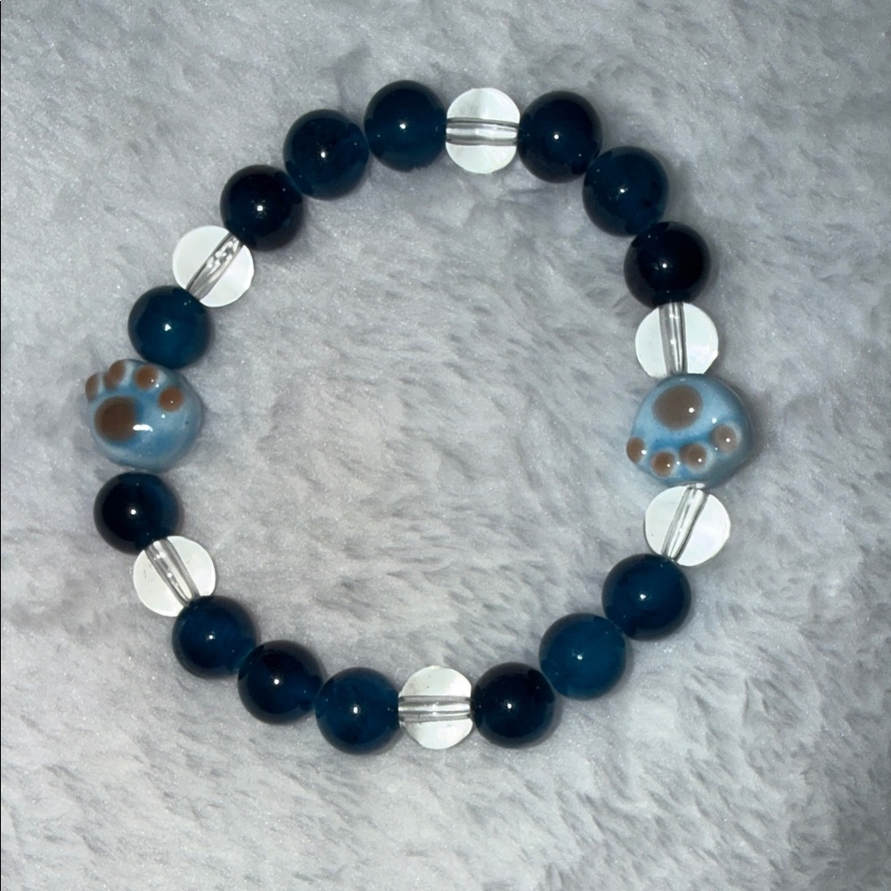Playful Blue and White Beaded Bracelet with Puppy Paws